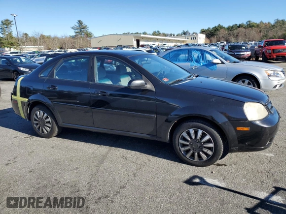2006 Suzuki Forenza z VIN KL5JD56ZX6K278029, wystawiony jako Copart lot #82026904 z przebiegiem 117 700 mil mil oraz Szkoda całkowita • Salvage title. Historia ofert i sprzedaży dostępna na DreamBid. Obrazek 4.
