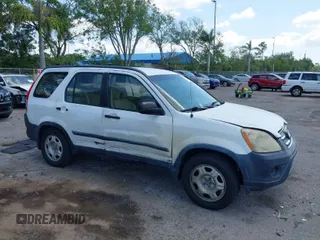 2005 Honda CR-V LX with VIN JHLRD68565C005484, listed as a IAAI auction lot 41983513 with 215,839 mi miles and . Bid and sale history available at carsss.com. Image 1.