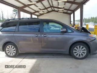 2014 Toyota Sienna Limited z VIN 5TDDK3DC9ES088584, wystawiony jako IAAI lot #42333016 z przebiegiem 115 138 mil mil oraz . Historia ofert i sprzedaży dostępna na DreamBid. Obrazek 13.