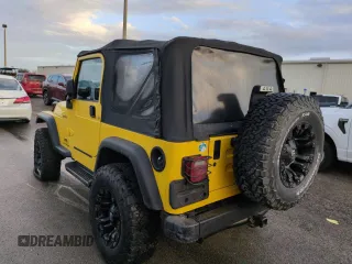 2003 Jeep Wrangler Sport with VIN 1J4FA49S93P373532, listed as a Copart auction lot 74595774 with 105,018 mi miles and Non Repairable. Bid and sale history available at carsss.com. Image 2.