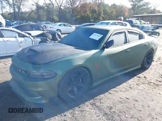 2019 Dodge Charger Scat Pack with VIN 2C3CDXGJ4KH572619, listed as a IAAI auction lot 40973015 with 40,148 mi miles and . Bid and sale history available at DreamBid. Image 18.