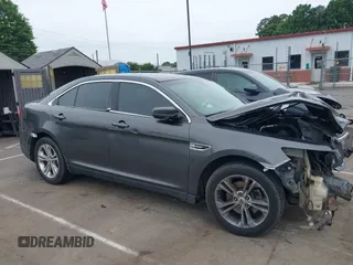 2015 Ford Taurus SEL with VIN 1FAHP2E81FG163058, listed as a IAAI auction lot 42221098 with 127,957 mi miles and . Bid and sale history available at carsss.com. Image 13.