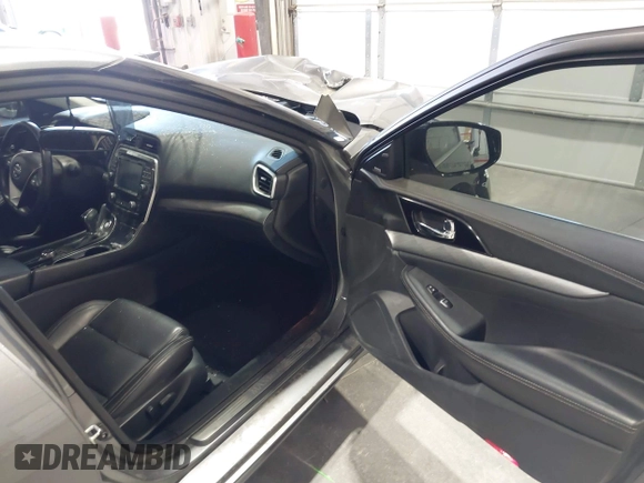 2018 Nissan Maxima SL z VIN 1N4AA6APXJC374220, wystawiony jako IAAI lot #42018130 z przebiegiem 119 776 mil mil oraz . Historia ofert i sprzedaży dostępna na DreamBid. Obrazek 5.