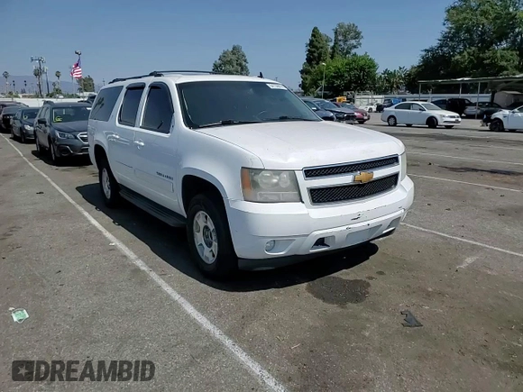 2014 Chevrolet Suburban LT with VIN 1GNSKJE79ER112840, listed as a Copart auction lot 64709074 with Not Provided miles and Salvage Title. Bid and sale history available at DreamBid. Image 11.