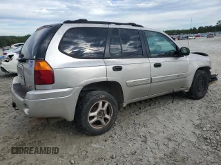 2004 GMC Envoy SLE with VIN 1GKDS13S142309781, listed as a Copart auction lot 73502854 with 349,449 mi miles and Salvage Title. Bid and sale history available at carsss.com. Image 3.