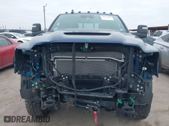 2024 Ram 2500 Power Wagon z VIN 3C6TR5EJ0RG315687, wystawiony jako IAAI lot #41614637 z przebiegiem 10 933 mil mil oraz . Historia ofert i sprzedaży dostępna na DreamBid. Obrazek 12.