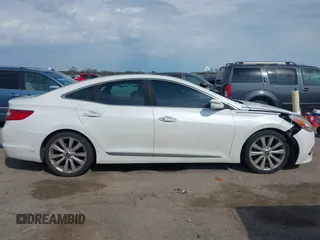 2015 Hyundai Azera Limited with VIN KMHFH4JG7FA476458, listed as a IAAI auction lot 41893979 with 149,114 mi miles and . Bid and sale history available at DreamBid. Image 13.