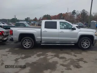 2017 GMC Sierra 1500 SLT z VIN 3GTU2NECXHG451794, wystawiony jako IAAI lot #40865850 z przebiegiem 243 866 mil mil oraz . Historia ofert i sprzedaży dostępna na DreamBid. Obrazek 13.