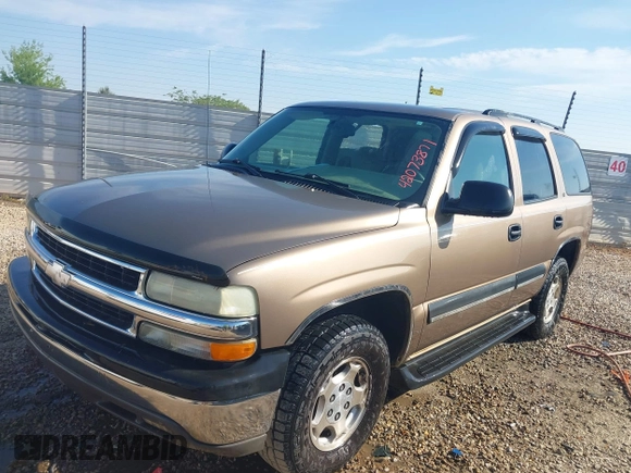 2004 Chevrolet Tahoe LT z VIN 1GNEC13Z04R130978, wystawiony jako IAAI lot #42073871 z przebiegiem 214 947 mil mil oraz . Historia ofert i sprzedaży dostępna na DreamBid. Obrazek 2.