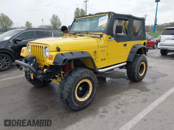 2000 Jeep Wrangler SE with VIN 1J4FA29P5YP705215, listed as a IAAI auction lot 41920532 with 92,927 mi miles and . Bid and sale history available at DreamBid. Image 2.