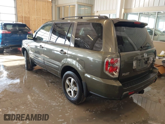 2006 Honda Pilot EX-L with VIN 5FNYF187X6B026463, listed as a IAAI auction lot 41612181 with 242,828 mi miles and . Bid and sale history available at DreamBid. Image 3.