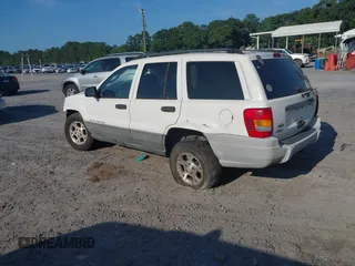 2002 Jeep Grand Cherokee Laredo with VIN 1J4GX48S62C310060, listed as a IAAI auction lot 42546172 with Not provided miles and . Bid and sale history available at DreamBid. Image 3.