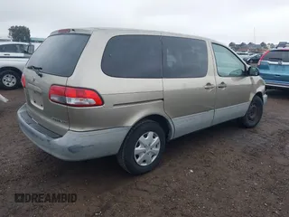 2001 Toyota Sienna CE with VIN 4T3ZF19C51U329489, listed as a IAAI auction lot 41535721 with 218,839 mi miles. Bid and sale history available at carsss.com. Image 4.