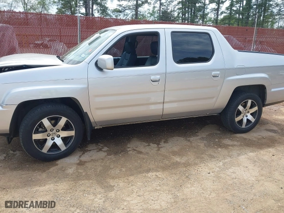 2014 Honda Ridgeline SE with VIN 5FPYK1F62EB013329, listed as a IAAI auction lot 41876728 with 127,014 mi miles. Bid and sale history available at carsss.com. Image 14.