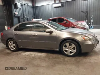 2006 Acura RL z VIN JH4KB165X6C009547, wystawiony jako IAAI lot #42073784 z przebiegiem 190 601 mil mil oraz . Historia ofert i sprzedaży dostępna na DreamBid. Obrazek 14.