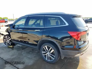 2017 Honda Pilot Elite with VIN 5FNYF6H04HB023609, listed as a Copart auction lot 52235425 with 107,997 mi miles and Salvage Title. Bid and sale history available at DreamBid. Image 2.