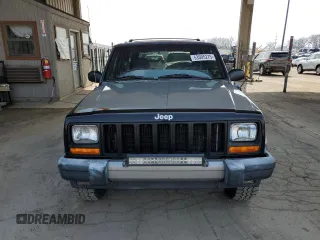 2000 Jeep Cherokee with VIN 1J4FF48S7YL221475, listed as a Copart auction lot 53005275 with 273,246 mi miles and Clean title. Bid and sale history available at DreamBid. Image 5.