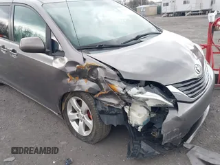 2013 Toyota Sienna LE with VIN 5TDJK3DC1DS049621, listed as a IAAI auction lot 42027930 with 206,148 mi miles and . Bid and sale history available at DreamBid. Image 6.