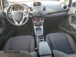 2016 Ford Fiesta SE with VIN 3FADP4BJ4GM114039, listed as a Copart auction lot 55833385 with 81,343 mi miles and Salvage Title. Bid and sale history available at DreamBid. Image 8.