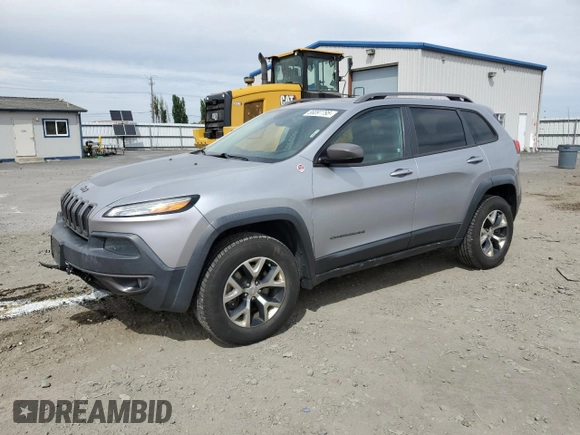 2014 Jeep Cherokee Trailhawk with VIN 1C4PJMBS6EW159174, listed as a Copart auction lot 56097795 with 130,299 mi miles and Salvage title. Bid and sale history available at DreamBid. Image 1.