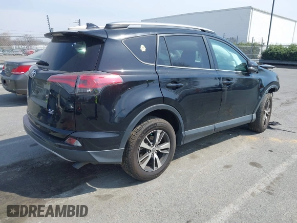 2018 Toyota RAV4 XLE with VIN 2T3RFREV6JW734993, listed as a IAAI auction lot 41790232 with 61,118 mi miles. Bid and sale history available at carsss.com. Image 4.