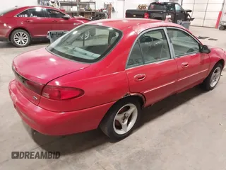 2002 Ford Escort Fleet Standard with VIN 3FAFP13P22R217224, listed as a IAAI auction lot 42032180 with 182,234 mi miles. Bid and sale history available at carsss.com. Image 4.