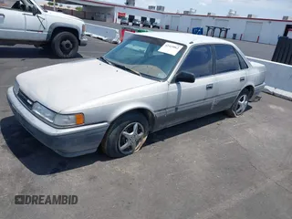 1988 Mazda 626 z VIN JM1GD2221J1550574, wystawiony jako IAAI lot #42415062 z przebiegiem 190 747 mil mil oraz . Historia ofert i sprzedaży dostępna na DreamBid. Obrazek 2.