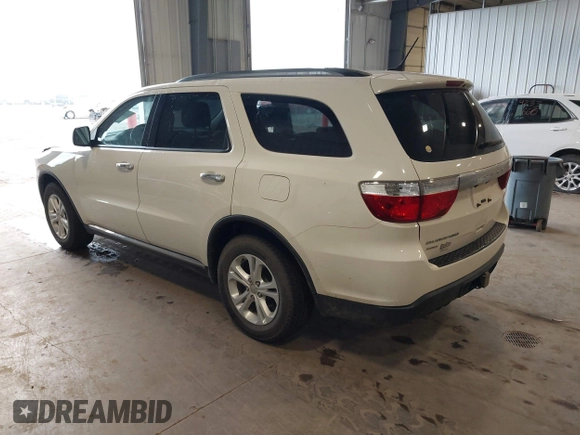 2012 Dodge Durango SXT with VIN 1C4RDJAGXCC295138, listed as a IAAI auction lot 42333094 with 96,581 mi miles and . Bid and sale history available at DreamBid. Image 3.