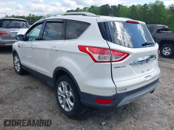 2015 Ford Escape Titanium with VIN 1FMCU0J91FUB13810, listed as a IAAI auction lot 41961798 with 139,265 mi miles. Bid and sale history available at carsss.com. Image 3.