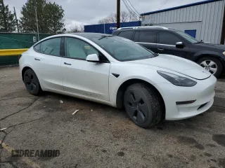 2023 Tesla Model 3 with VIN 5YJ3E1EAXPF600008, listed as a Copart auction lot 51868055 with 58,733 mi miles and Salvage title. Bid and sale history available at DreamBid. Image 4.