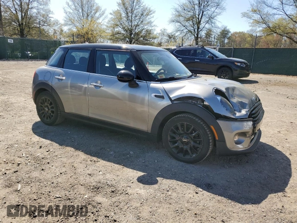 2019 MINI Hardtop 4 Door Cooper with VIN WMWXU1C52K2J02579, listed as a Copart auction lot 53507295 with 94,350 mi miles and Salvage Title. Bid and sale history available at DreamBid. Image 4.