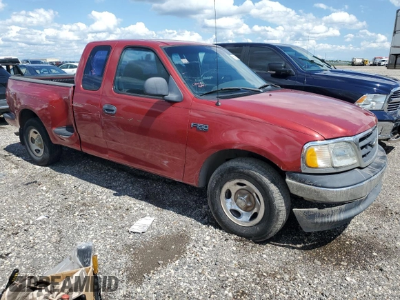 2001 Ford F-150 XL with VIN 1FTZX07261KA62955, listed as a Copart auction lot 56580915 with 159,451 mi miles and Salvage title. Bid and sale history available at DreamBid. Image 4.