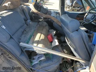 1996 Buick Park Avenue with VIN 1G4CW52KXTH613655, listed as a Copart auction lot 77555014 with 211,212 mi miles and Salvage Title. Bid and sale history available at carsss.com. Image 11.