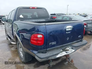 2003 Ford F-150 XLT with VIN 1FTRW07L33KC83234, listed as a IAAI auction lot 41894573 with 215,232 mi miles. Bid and sale history available at carsss.com. Image 3.