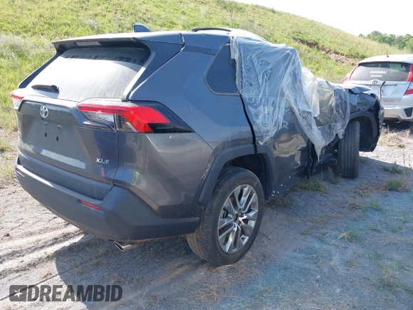 2022 Toyota RAV4 XLE Premium with VIN 2T3C1RFV5NC195230, listed as a IAAI auction lot 40495536 with 30,824 mi miles and . Bid and sale history available at DreamBid. Image 4.