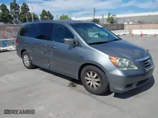 2009 Honda Odyssey EX-L with VIN 5FNRL38769B017160, listed as a IAAI auction lot 41991727 with 207,057 mi miles. Bid and sale history available at carsss.com. Image 1.