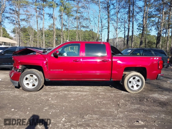 2018 Chevrolet Silverado 1500 LT with VIN 3GCUKREC4JG204672, listed as a IAAI auction lot 41638941 with 134,506 mi miles. Bid and sale history available at carsss.com. Image 14.
