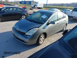 2004 Toyota Prius with VIN JTDKB20U640034581, listed as a IAAI auction lot 41895908 with 213,708 mi miles. Bid and sale history available at carsss.com. Image 2.