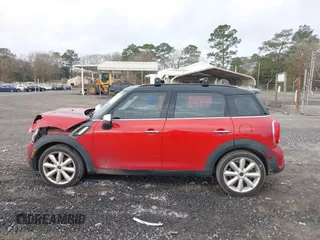 2015 MINI Countryman S with VIN WMWZC3C50FWT05122, listed as a IAAI auction lot 41572503 with 120,885 mi miles and . Bid and sale history available at DreamBid. Image 14.