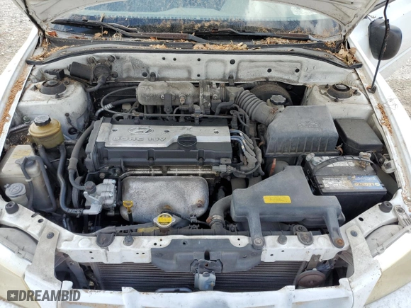 2002 Hyundai Accent GL with VIN KMHCG35C82U230535, listed as a Copart auction lot 77709454 with 116,200 mi miles and Non Repairable. Bid and sale history available at carsss.com. Image 11.