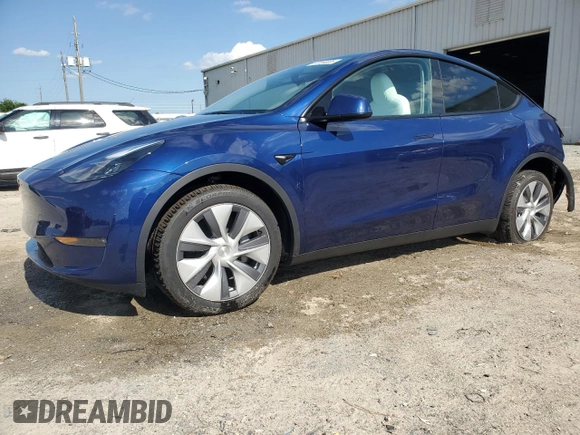 2023 Tesla Model Y Long Range z VIN 7SAYGDEE3PA178832, wystawiony jako Copart lot #57156005 z przebiegiem 12 920 mil mil oraz Szkoda całkowita • Salvage title. Historia ofert i sprzedaży dostępna na DreamBid. Obrazek 1.