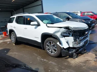 2020 GMC Acadia SLT with VIN 1GKKNULS2LZ184943, listed as a IAAI auction lot 42472810 with 68,699 mi miles and . Bid and sale history available at DreamBid. Image 1.