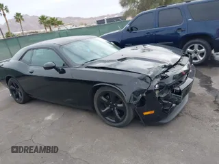 2014 Dodge Challenger R/T Plus z VIN 2C3CDYBT3EH213331, wystawiony jako IAAI lot #41909867 z przebiegiem 107 928 mil mil oraz . Historia ofert i sprzedaży dostępna na DreamBid. Obrazek 1.