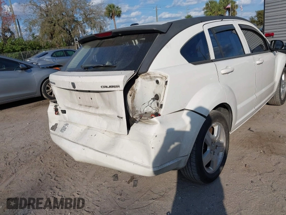 2009 Dodge Caliber SXT with VIN 1B3HB48A69D130857, listed as a IAAI auction lot 41526199 with 163,796 mi miles and . Bid and sale history available at DreamBid. Image 16.