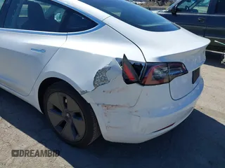2019 Tesla Model 3 Mid Range with VIN 5YJ3E1EA1KF422983, listed as a IAAI auction lot 41861334 with 53,017 mi miles. Bid and sale history available at carsss.com. Image 6.