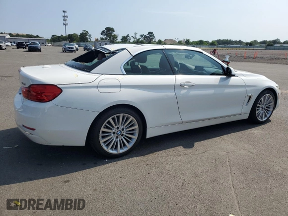 2015 BMW 4 Series 428i with VIN WBA3V7C57FP772880, listed as a Copart auction lot 62740295 with 107,673 mi miles and Salvage title. Bid and sale history available at DreamBid. Image 3.
