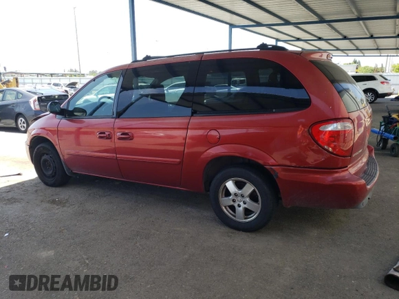 2005 Dodge Caravan SXT with VIN 2D4GP44L65R120861, listed as a Copart auction lot 57040565 with 244,971 mi miles and Salvage title. Bid and sale history available at DreamBid. Image 2.