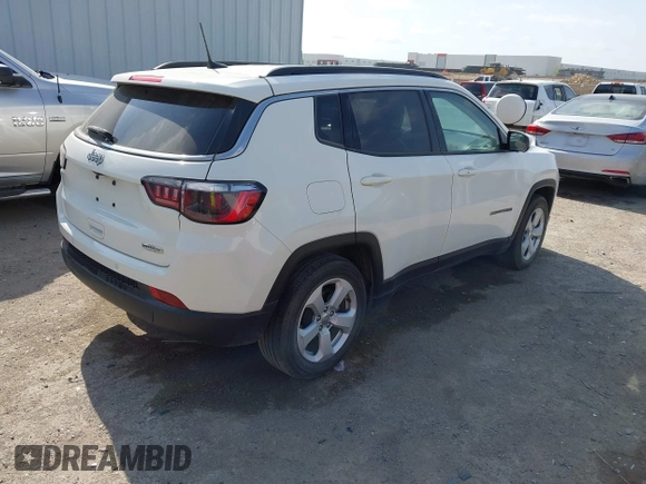 2021 Jeep Compass Latitude with VIN 3C4NJCBBXMT563942, listed as a IAAI auction lot 42045108 with 166,153 mi miles and . Bid and sale history available at DreamBid. Image 4.