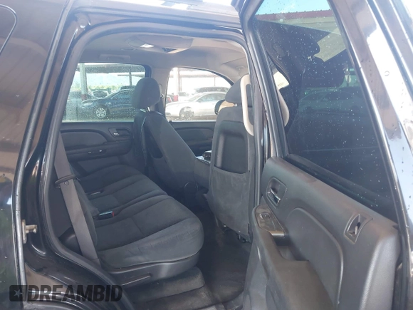 2007 Chevrolet Tahoe LS with VIN 1GNFC13C07J400472, listed as a IAAI auction lot 42209311 with 212,924 mi miles and . Bid and sale history available at DreamBid. Image 8.