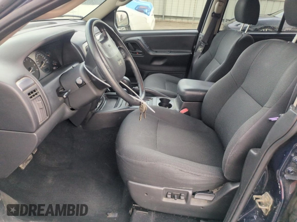 2004 Jeep Grand Cherokee Laredo with VIN 1J4GW48S84C200259, listed as a Copart auction lot 51002325 with 158,193 mi miles and Salvage Title. Bid and sale history available at carsss.com. Image 7.